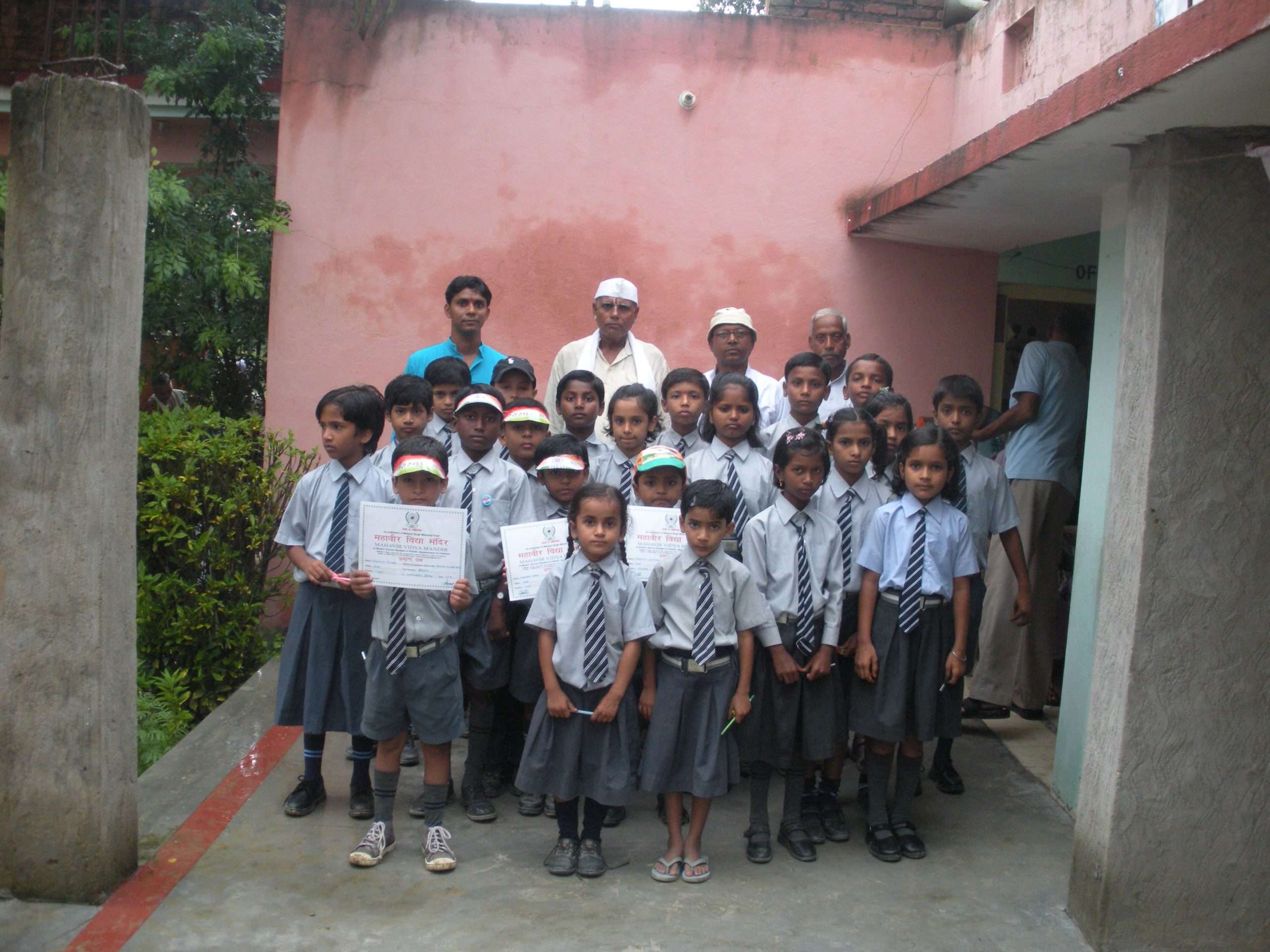 Mahavir Vidya Mandir certificate ceremony — children of the Mahavir Singh Memorial Trust's school